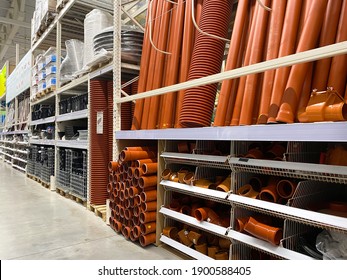 Assortment Of A Hardware Store, Pipes. Building Materials And Manufactured Goods Are Stacked And Put Up For Sale In A Hardware Store