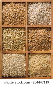 An Assortment Of Healthy Whole Grains In A Wooden Box.