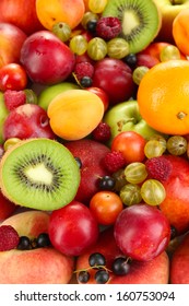 Assortment of juicy fruits   background