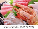 Assortment of luxurious sashimi (tuna, raw yellowtail shrimp)