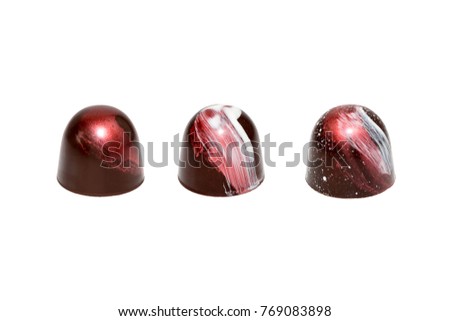 Assortment of luxury handmade chocolate candy collection isolated on white background. Set of colorful chocolate bonbons.