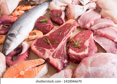 Assortment of meat and seafood . Beef , chicken , fish and pork