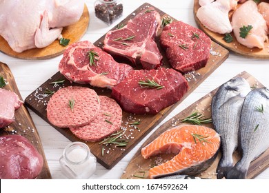 Assortment Of Meat And Seafood . Beef , Chicken , Fish And Pork