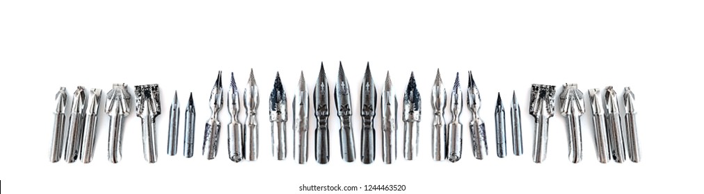 Assortment Metal Nib Pen Tip Isolated On White Background. Set Of Old Worn Soviet Quill. Iron Tip For Fountain Ink Pen. Banner, Copy Space