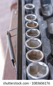 Assortment Of Nuts In An Old Socket Wrench Set