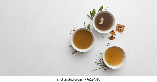 Assortment ob Broth in Small Bowls
