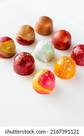 Assortment of painted chocolate pralines. Handcrafted bonbons.Delicious dessert. 