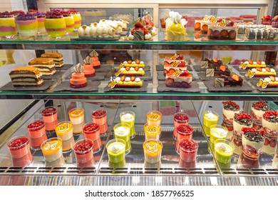 Assortment Of Pastries And Cakes In Patisserie Display