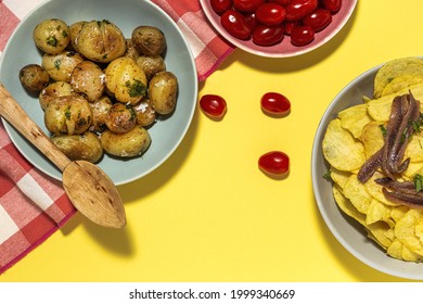 Assortment of potato, fried, cooked, chips and french fries snacks. With sunlight