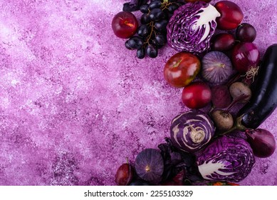 Assortment of purple vegetables on violet background - Powered by Shutterstock