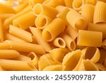 Assortment of raw typical italian pasta, european food 