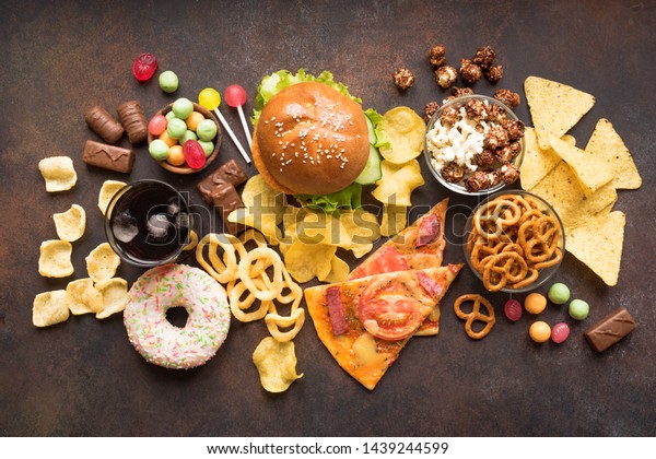 Assortment of Unhealthy Food, top view,\
copy space. Unhealthy eating, junk food\
concept.