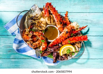 Assortment Various Barbecue Mediterranean Grill Food - Fish, Octopus, Shrimp, Crab, Seafood, Mussels, Summer Diet Bbq Party Fest, With Kebab, Sauces, Light Blue Sunne Wooden Background