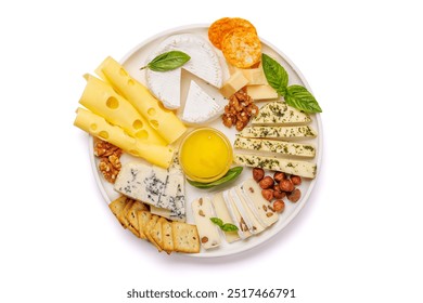 An assortment of various cheeses arranged on a plate, highlighting different textures, colours, and types, perfect for a tasting or appetizer. Isolated on white background - Powered by Shutterstock