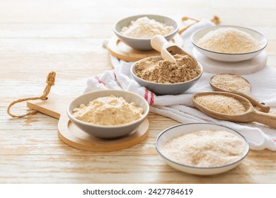 Assortment of various gluten free flour,  without carbohydrate (almond and coconut flour, psyllium husk powder, rough-ground flaxseed flour) - Powered by Shutterstock