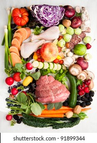 Assortment Of Various Healthy Foods. Vegetables, Meats, Fruit, Oil, Nuts, Berries And Fish