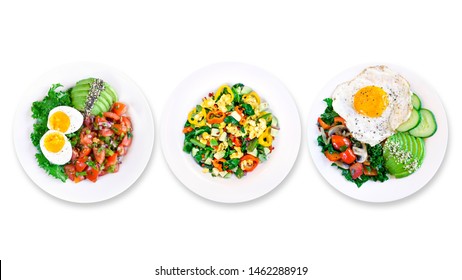 Assortment Of Various Healthy Keto Paleo Diet Breakfasts On White Plate. White Background. Top View. Isolated. Copy Space. 