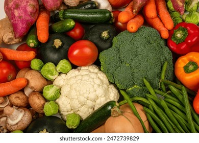 Assortment of vegetables with carrots, green beans mushrooms, bell peppers, butternut, cauliflower, Brussels sprouts, zucchini, broccoli, tomatoes, squash, garlic and ginger. - Powered by Shutterstock