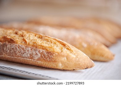 Assortments of bread, freshly baked on shelf. Bakery goods. Variety of loaves and buns.  - Shutterstock ID 2199727893