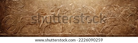 Assyrian relief on the wall. Ancient stone carving of the Middle East. Historical and culturical background on the theme of civilizations of Assyria, Mesopotamia, Babylon, interfluve, Sumerian. Stock photo © 