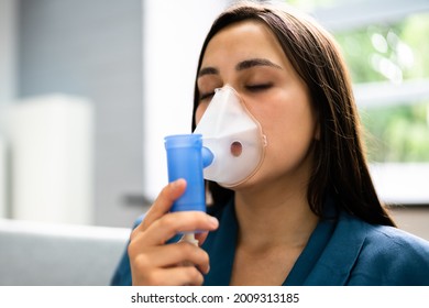 Asthma Patient Breathing Using Oxygen Mask And COPD Nebulizer