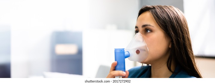 Asthma Patient Breathing Using Oxygen Mask And COPD Nebulizer