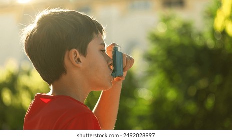 Asthmatic child with inhaler on the street to avoid asthma related symptoms - Powered by Shutterstock