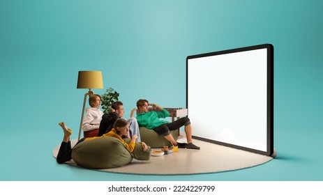Astonished young people, emotional friends watching football match, sport show. Youth sitting on sofa in front of huge 3D model of tv screen. Concept of sport, leisure activities, betting, ad - Shutterstock ID 2224229799