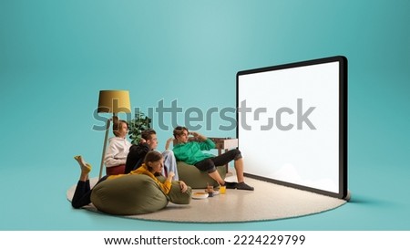 Astonished young people, emotional friends watching football match, sport show. Youth sitting on sofa in front of huge 3D model of tv screen. Concept of sport, leisure activities, betting, ad