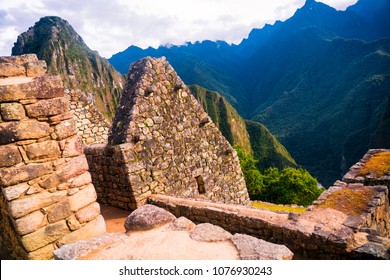 Astonishing panorama of Machu Picchu with ancient stone buildings and architecture at sunrise, old inca empire capital in Cusco, Peru, South America - Shutterstock ID 1076930243