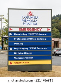 Astoria, OR, USA - September 21, 2022; Vertical Sign For Columbia Memorial Hospital With Department Names And Directions