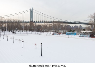 Astoria Queens, New York USA - December 19 2020: Astoria Pool At Astoria Park Covered With Snow During Winter In Astoria Queens New York With The Triborough Bridge