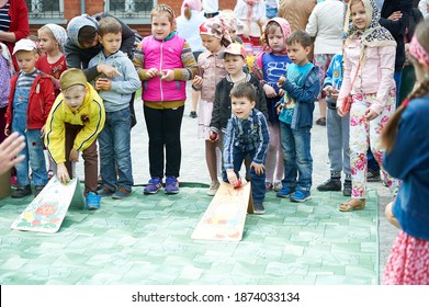 Astrakhan, Russia - 05.08.2016: Egg Rolling, Or An Easter Egg Roll Is A Traditional Game Played With Eggs At Easter