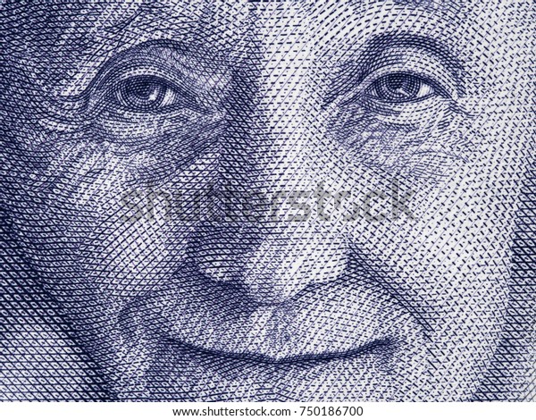 Astrid Lindgren portrait on Sweden 20 krona (2015) banknote closeup macro, famous Swedish children writer.