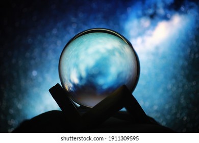 Astrological background. Crystal ball with predictions. Horoscope of the stars. Fortune telling and determination fate. Soothsayer with a crystal ball.