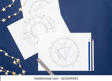 Astrological natal chart on tye phantom blue background, horoscope