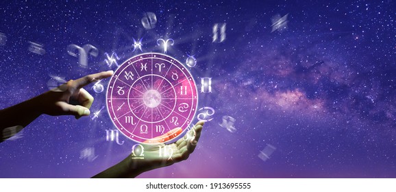 Astrological zodiac signs inside of horoscope circle. Astrology, knowledge of stars in the sky over the milky way and moon. The power of the universe concept. - Shutterstock ID 1913695555