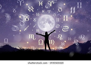 Astrological zodiac signs inside of horoscope circle. Illustration of Woman silhouette consulting the stars and moon over the zodiac wheel and milky way background. The power of the universe concept. - Shutterstock ID 1935503320