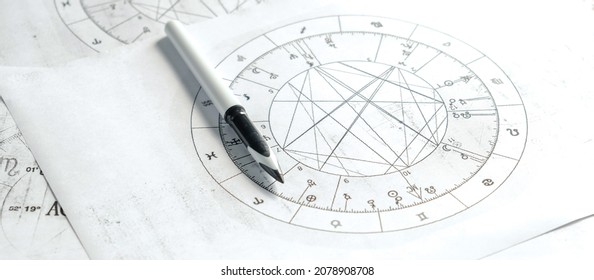 Astrology. Astrologer calculates natal chart and makes a forecast of fate.Tarot cards, Fortune telling on tarot cards magic crystal, occultism, Esoteric background. Fortune telling,tarot predictions.