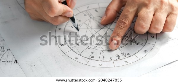 Astrology. Astrologer calculates a natal\
chart and makes a forecast of fate. Astrological forecast,\
mysticism, science. Astrological\
background.