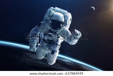Astronaut in deep space. Elements of this image furnished by NASA