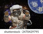 Astronaut and deep space. Science theme.  The elements of this image furnished by NASA.

