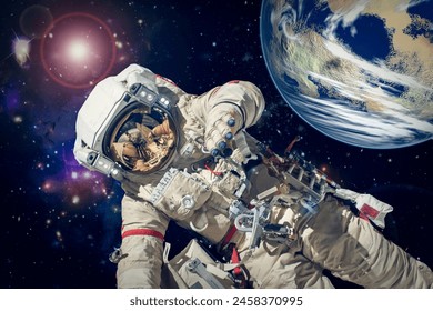 Astronaut and deep space. Science theme.  The elements of this image furnished by NASA.