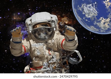 Astronaut and deep space. Science theme.  The elements of this image furnished by NASA.

 - Powered by Shutterstock