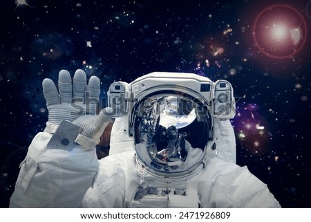 Astronaut and the earth. The elements of this image furnished by NASA.