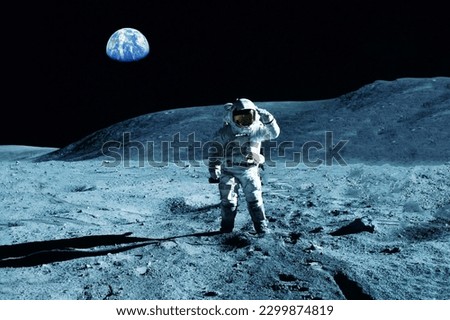 An astronaut explores the moon. Elements of this image furnishing NASA. High quality photo