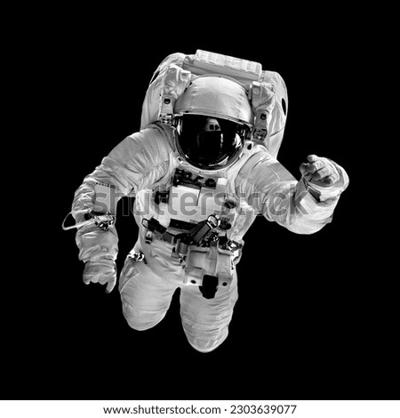 astronaut flies over the black backgrounds.