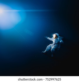 Astronaut floating in outer space / high contrast image