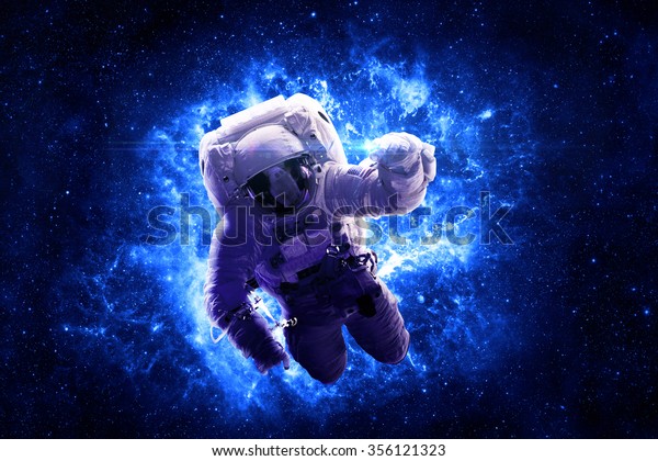 Astronaut Floating Through Space - Elements of this
Image Furnished by
NASA