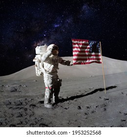 Astronaut holding an American flag on moon surface with the stars and outer space on the background. Elements of this image furnished by NASA.